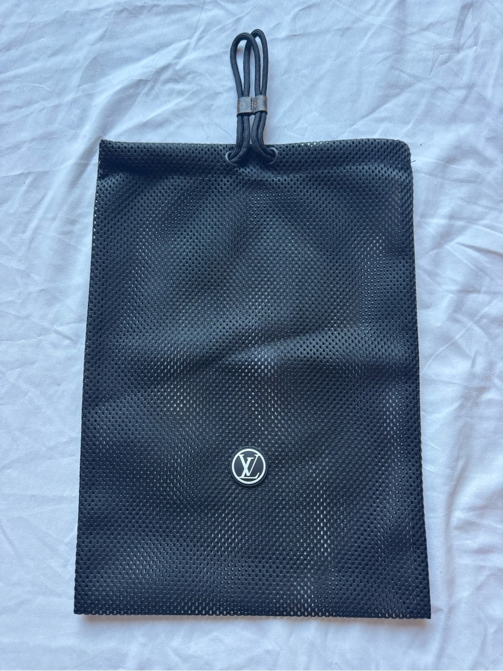Louis Vuitton Black Perforated Drawstring Pouch front closure